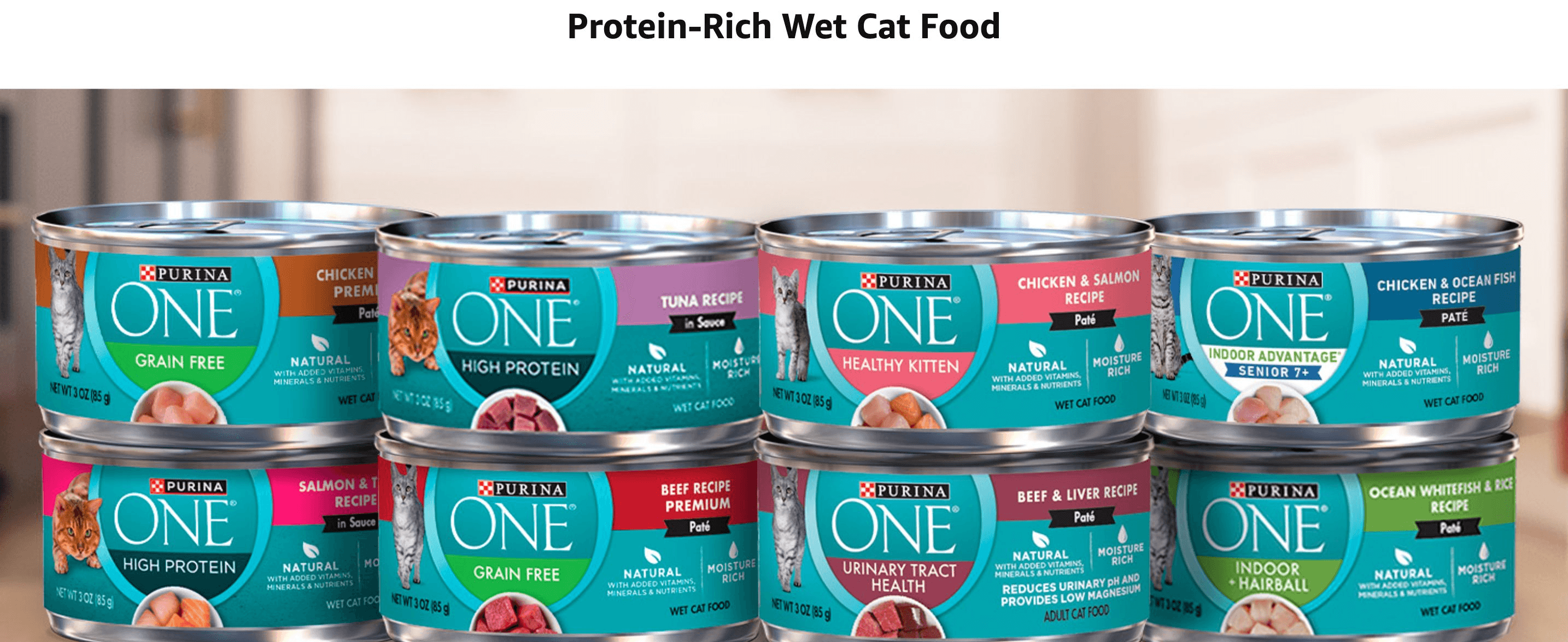 Displays the variety of protein-rich wet cat food cans in the Purina ONE line to show shoppers the range of recipes available.