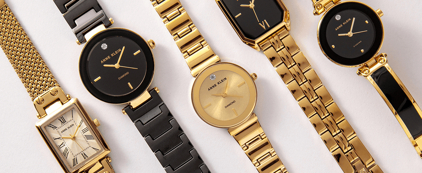 Lays out the range of gold and black watch styles side by side so shoppers see the breadth of the collection.