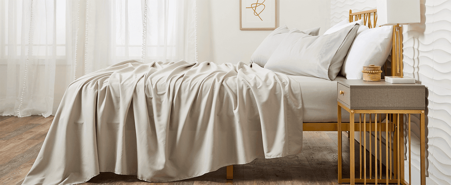 Shows the sheets styled in a real bedroom setting to help shoppers envision the product in their own home.