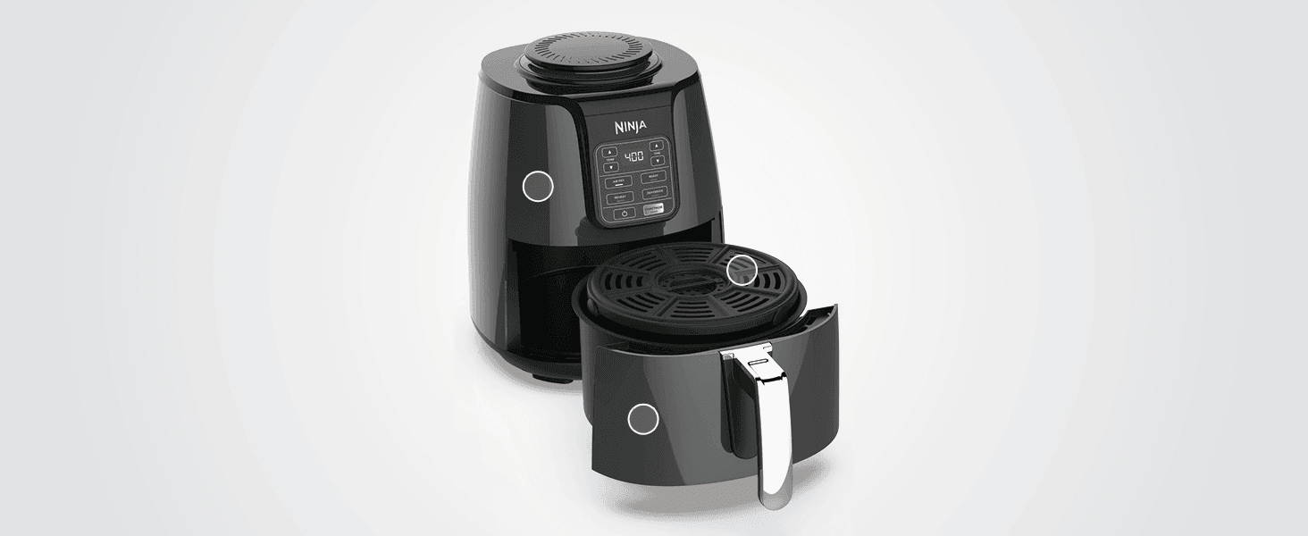 Shows the air fryer and its removable basket on a clean background so shoppers can see the product's full form factor.