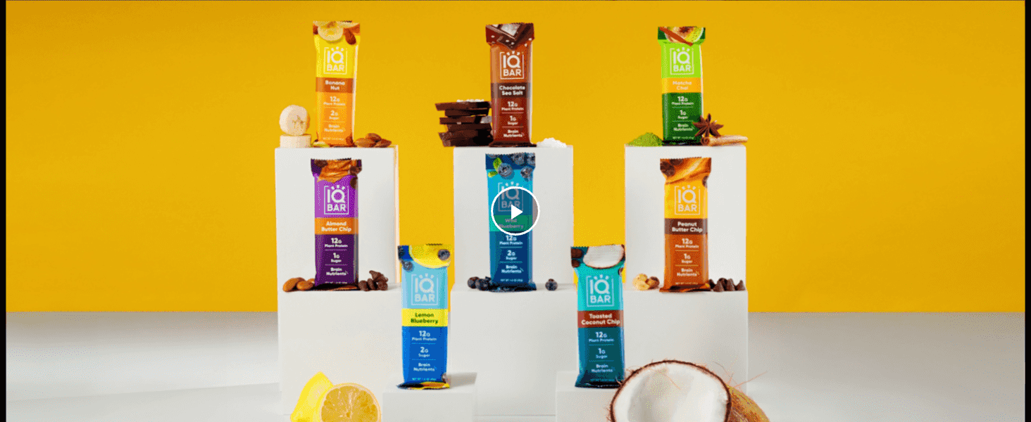 Shows the full flavor range on podiums so shoppers see the variety the brand offers.