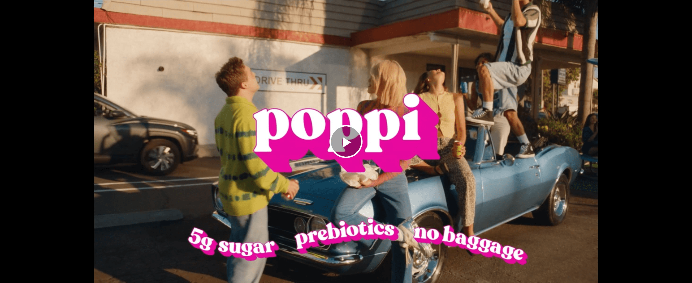 Uses a brand video still of friends at a retro drive-thru to build a fun, social feel around the drink. Reinforces the core claims of low sugar and prebiotics with a simple text overlay.
