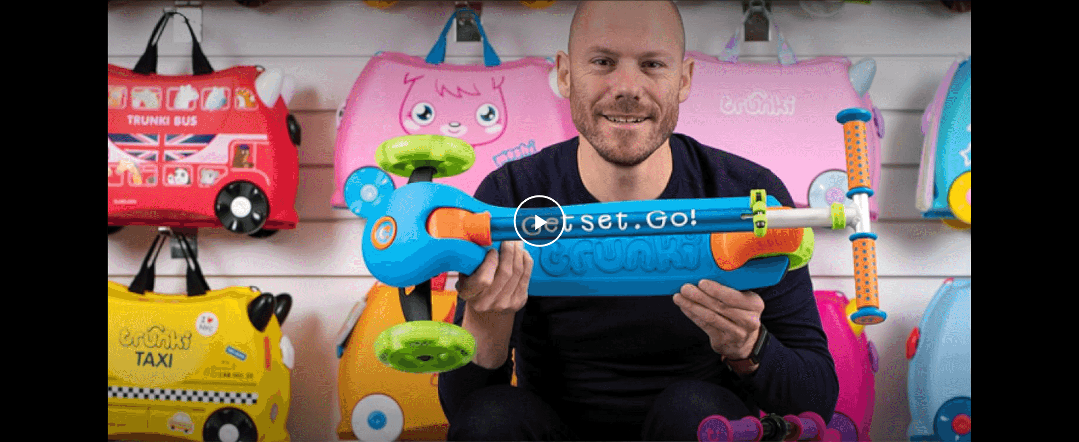 Introduces the Trunki brand and product range through a friendly video presenter to build trust and familiarity with shoppers.