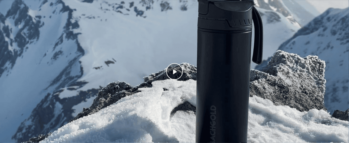 Shows the bottle in a rugged, extreme outdoor environment to build an aspirational, adventure-ready brand image.