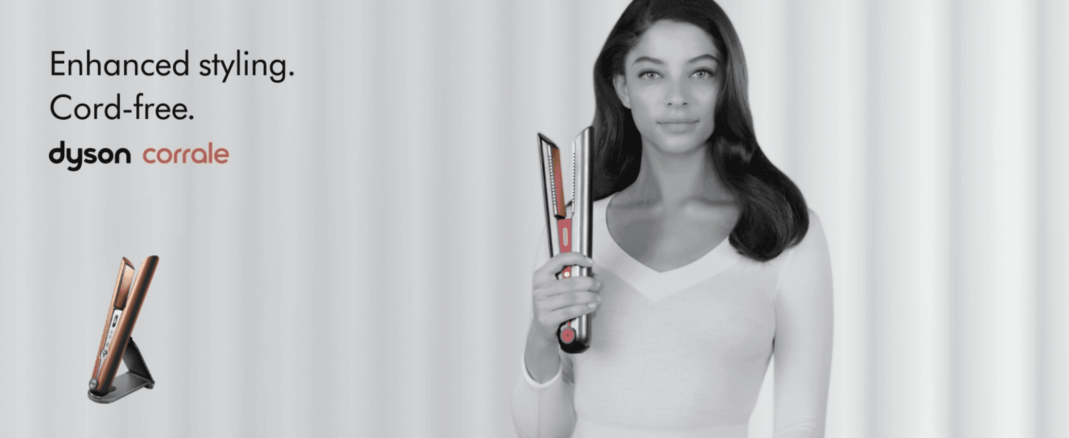 Introduces the Dyson Corrale styler with brand logo and a simple cord-free benefit statement. Highlights cord-free enhanced styling as the product's core benefit.