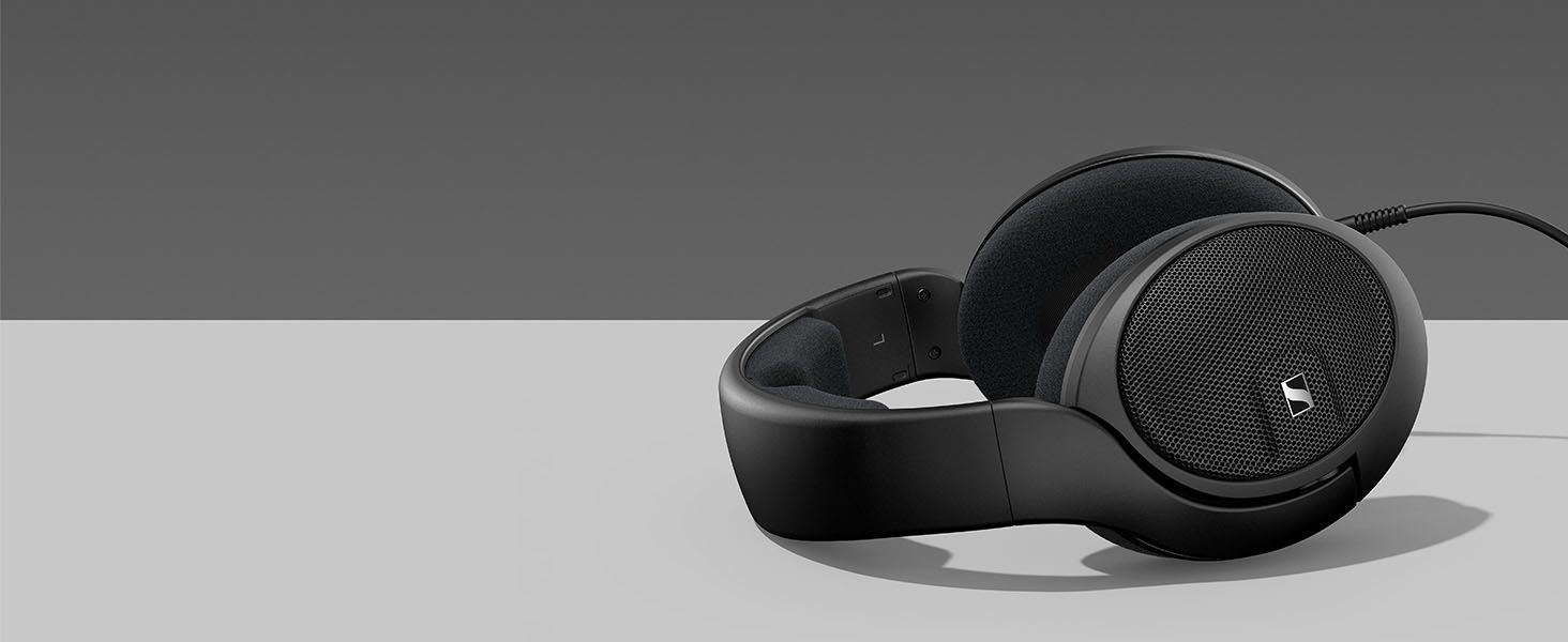 Shows the open-back headphones alone on a clean studio backdrop so shoppers can judge the design and build without distractions.