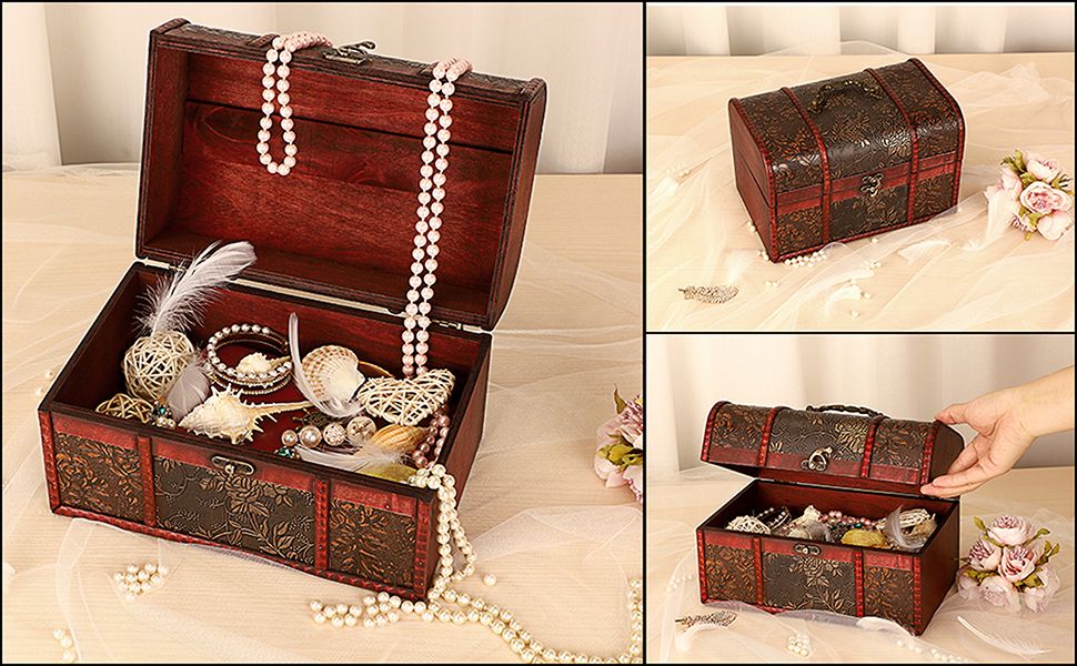 Shows the treasure chest styled with pearls, shells, and jewelry in a soft elegant setting so shoppers can envision using it as a keepsake or jewelry storage piece.