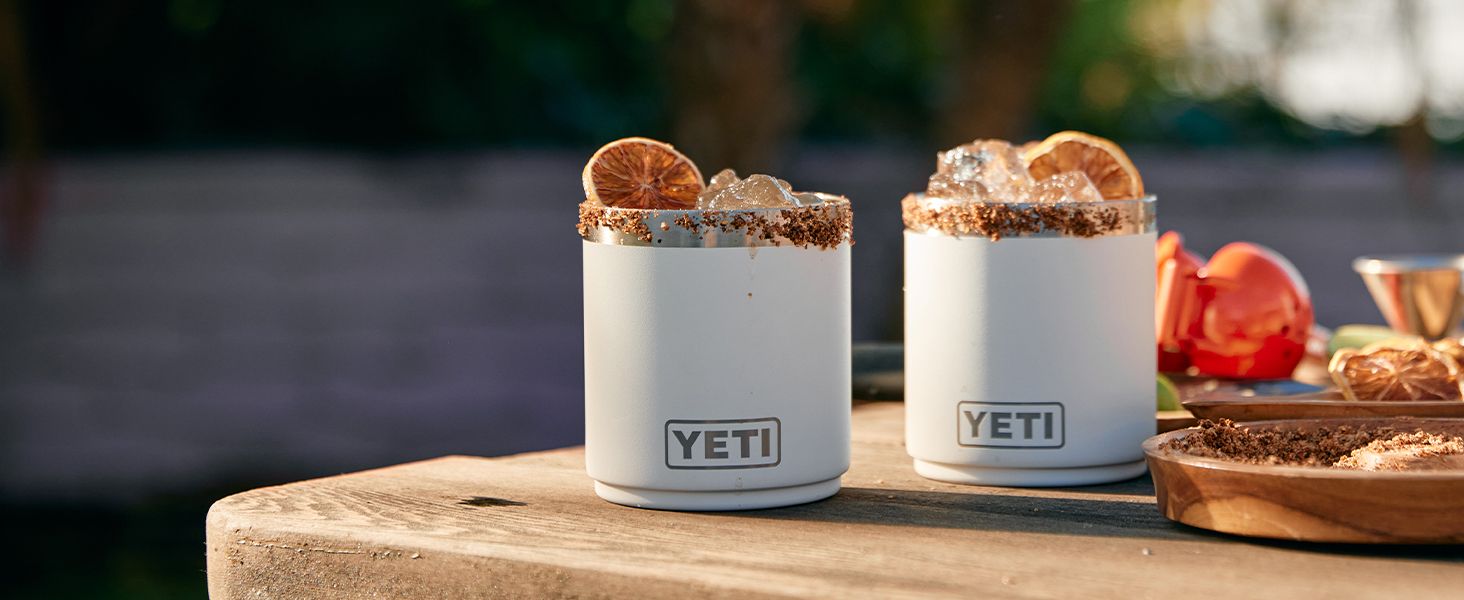 Displays the product in an appealing lifestyle context with beverages to help shoppers visualize product use and quality.