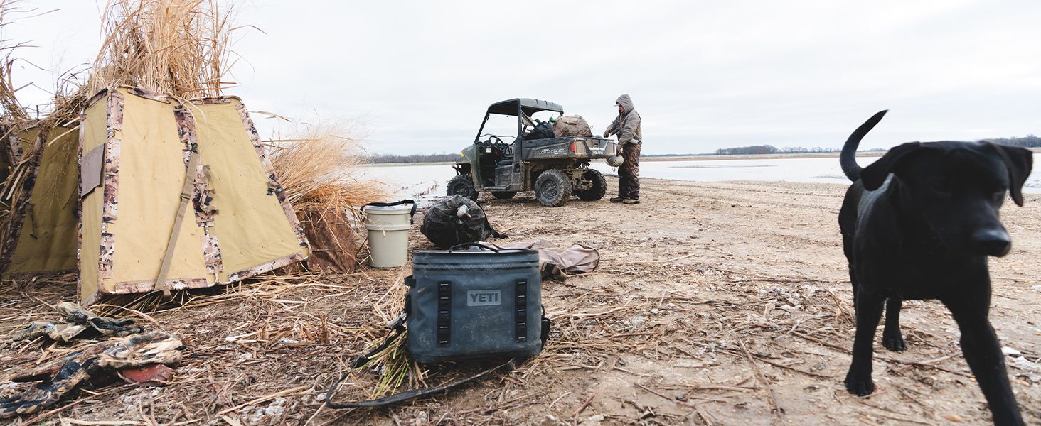 Shows the product in a real-world outdoor hunting or camping setting to help shoppers envision the product in use during their own adventures.