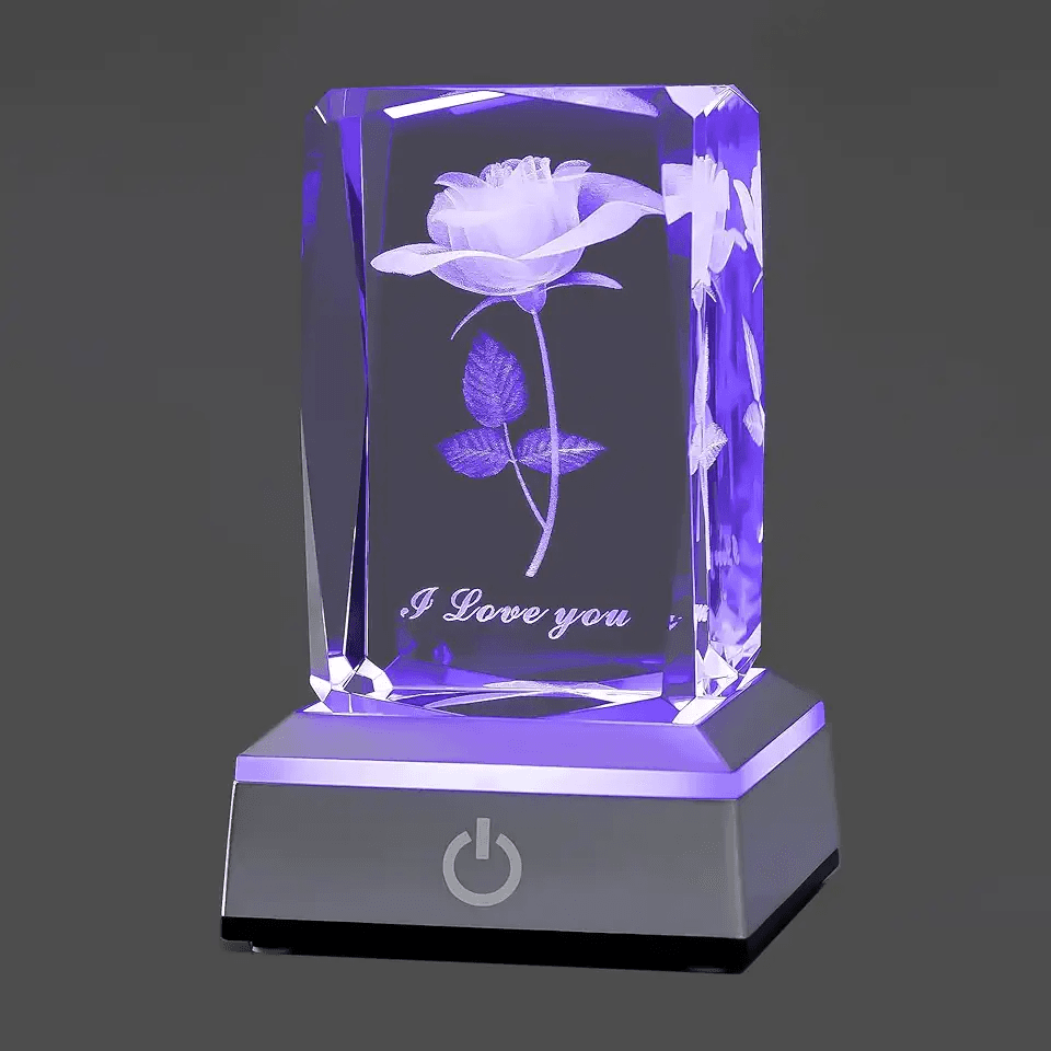 Showcase the unique 3D etched design and LED illumination feature of the crystal gift Highlight the romantic message and floral design etched inside the crystal, enhanced by the purple LED light