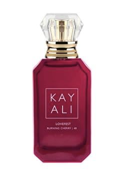 Showcases the premium, elegant packaging of the perfume to convey a sense of luxury and high-quality product.