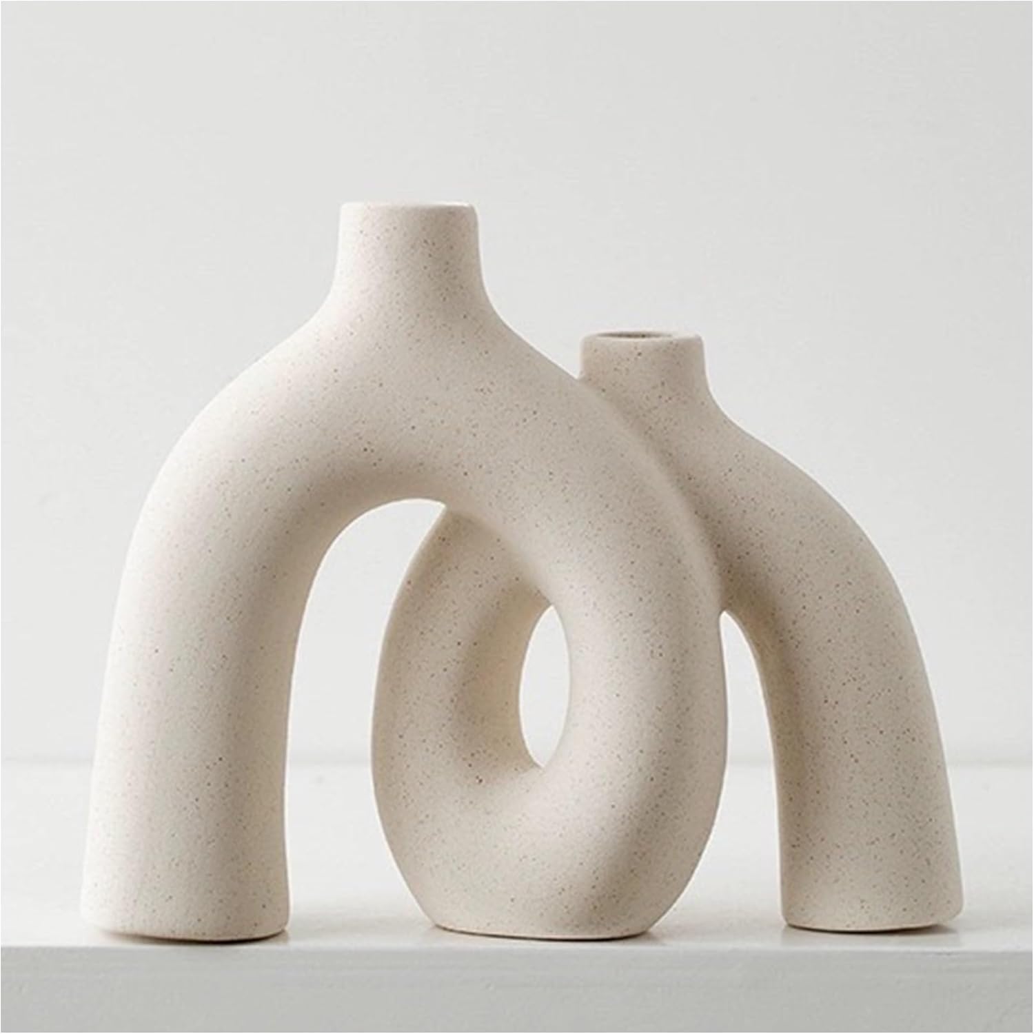 Showcases the product's distinctive sculptural form and artistic appeal as a decorative piece.