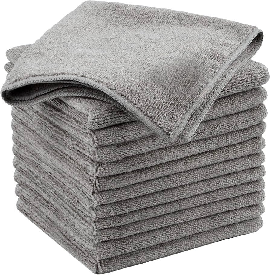 Showcases the product's appearance and quantity, highlighting the stack of soft, gray microfiber towels.