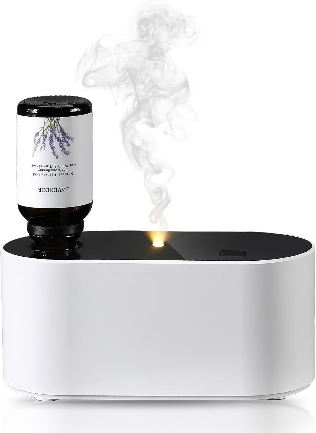 Shows the product actively diffusing lavender essential oil with visible vapor, demonstrating how it works in a real-world setting to help shoppers visualize the aromatherapy experience.