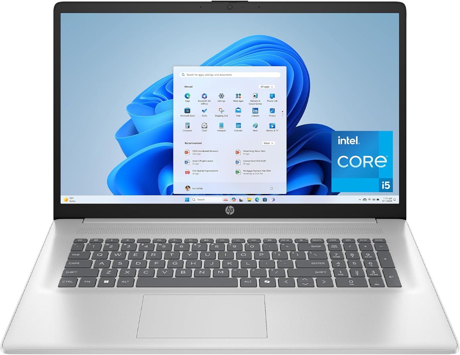 Shows the complete HP laptop with screen and keyboard visible, displaying the Windows 11 interface and highlighting the Intel Core i5 processor to communicate…