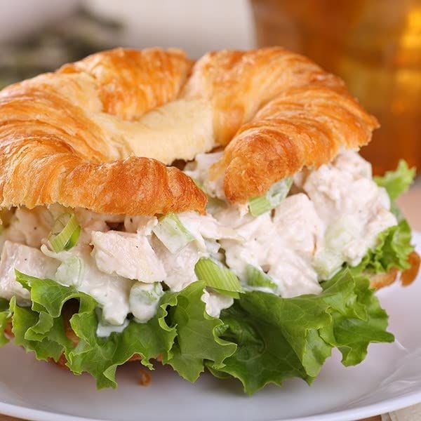 Shows the product in a real-world dining context to help shoppers visualize the meal experience and appeal of the prepared sandwich. Demonstrates how the…