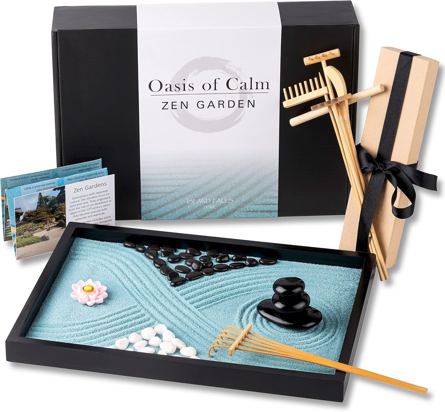 Displays the complete zen garden set with all included components—sand tray, stones, rake, wooden accessories, and decorative elements—to show shoppers…