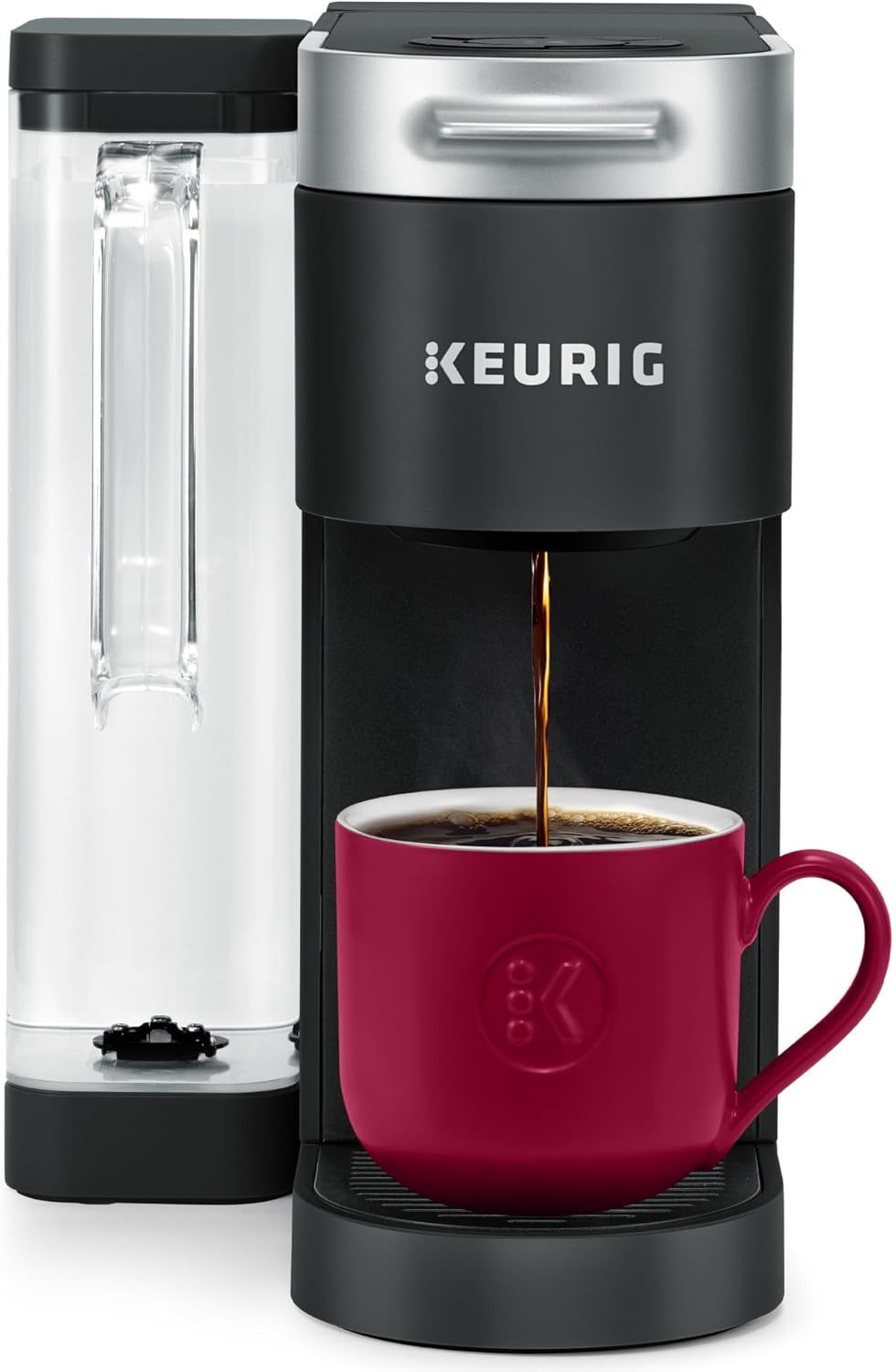 Shows the coffee maker actively dispensing coffee into a mug to demonstrate how the product works and what it does in real use. Displays the core sellable Keurig coffee maker with its water…