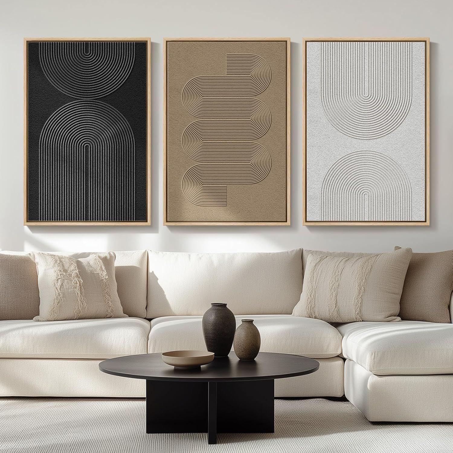 Shows three framed wall art pieces with raised geometric line patterns in different colors, demonstrating the product's modern aesthetic and how it looks displayed together in a living space.…