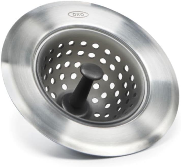 Displays the core product clearly on a white background to show the stainless steel construction and perforated basket design for catching food debris.