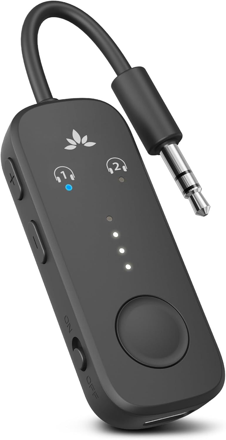 Shows the core product clearly with its key features visible including dual headphone connection capability, LED status indicators, and control button to…
