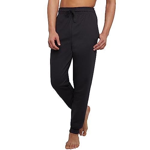 Shows the core product, black drawstring pants, worn by a model to demonstrate fit and style for shoppers. Uses a human model to help shoppers visualize how the pants fit on the body and understand…