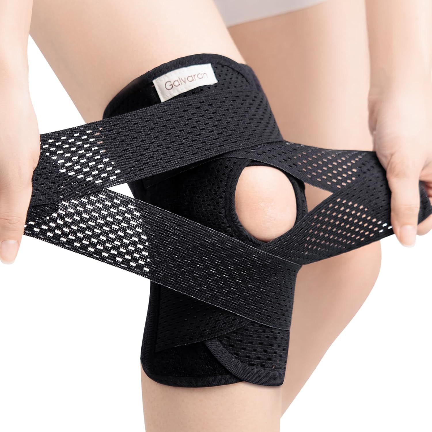 Shows a person wearing the knee brace to demonstrate proper fit, placement, and how the product looks when worn, helping shoppers visualize scale and usage. Demonstrates the functional features of…
