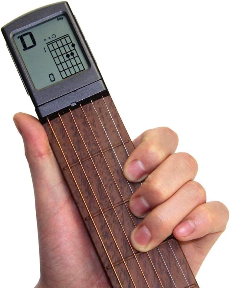 Shows the core product, a pocket-sized digital guitar chord trainer with LCD screen and physical strings, demonstrating its compact design and functionality for on-the-go practice. Uses a human hand…