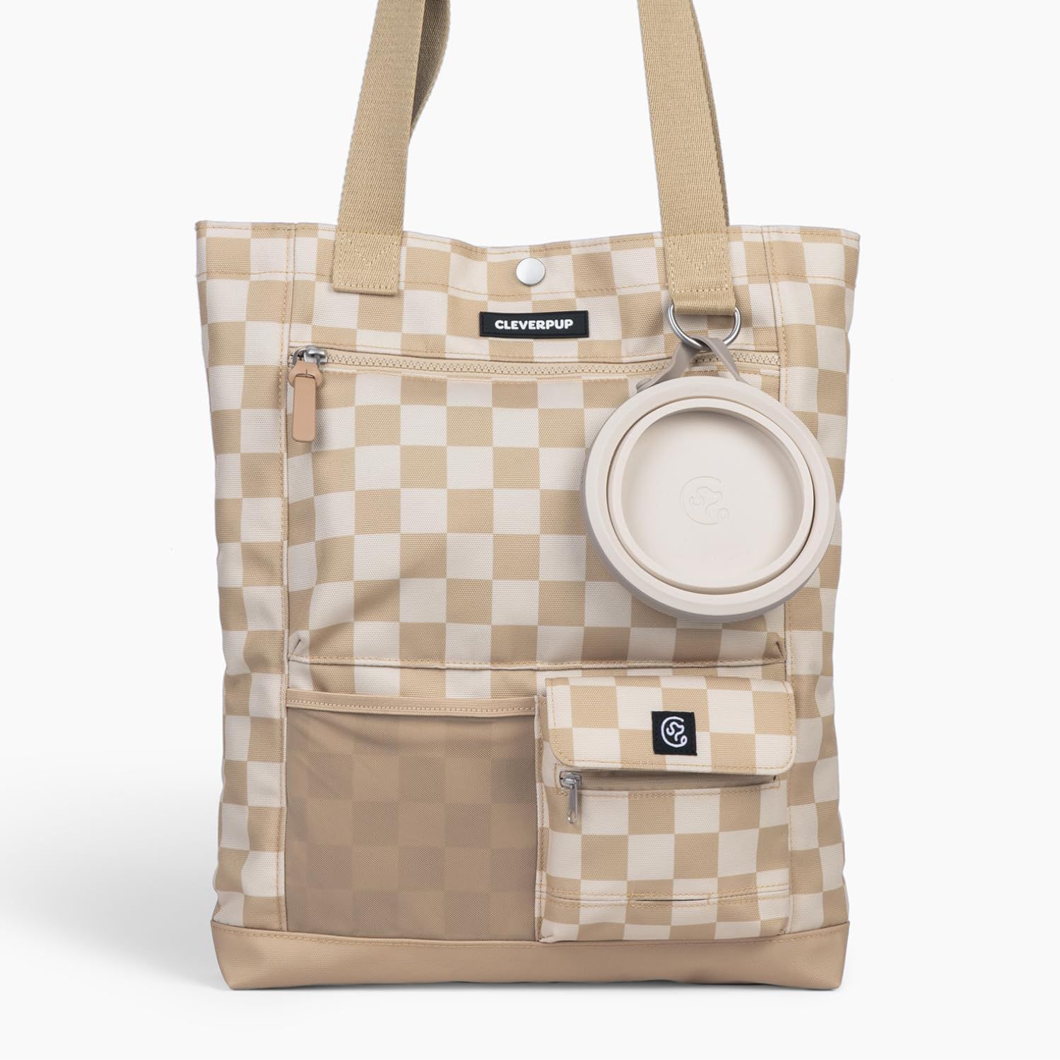 Displays the core product—a pet tote bag with integrated storage pockets and an attached collapsible bowl—to show shoppers exactly what they will receive. Highlights that a collapsible bowl is…