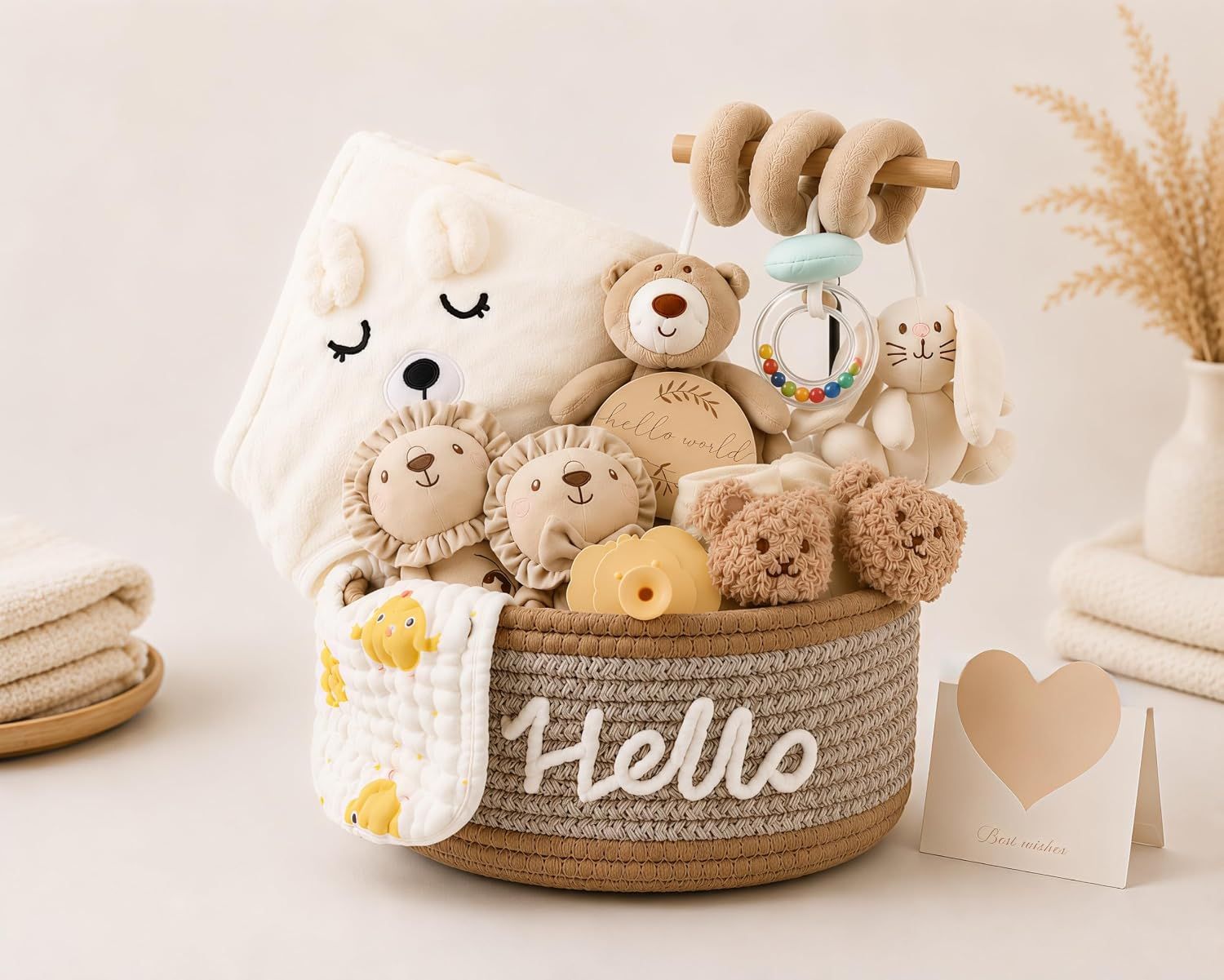 Displays a curated collection of baby toys and accessories arranged in a decorative basket to show the complete gift set the shopper will receive. Shows all the individual items included in the gift…