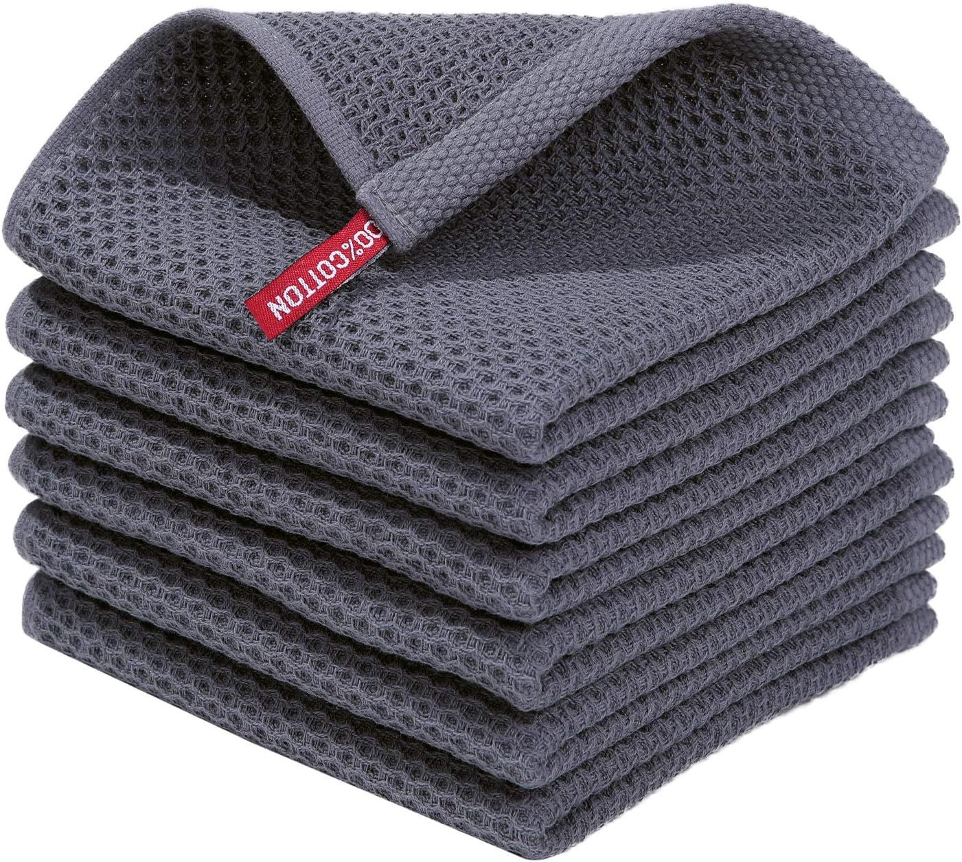 Shows the core product as a multi-pack of gray waffle-weave towels with a branded red tag, clearly displaying the quantity and texture to help shoppers understand what they will receive. Displays…