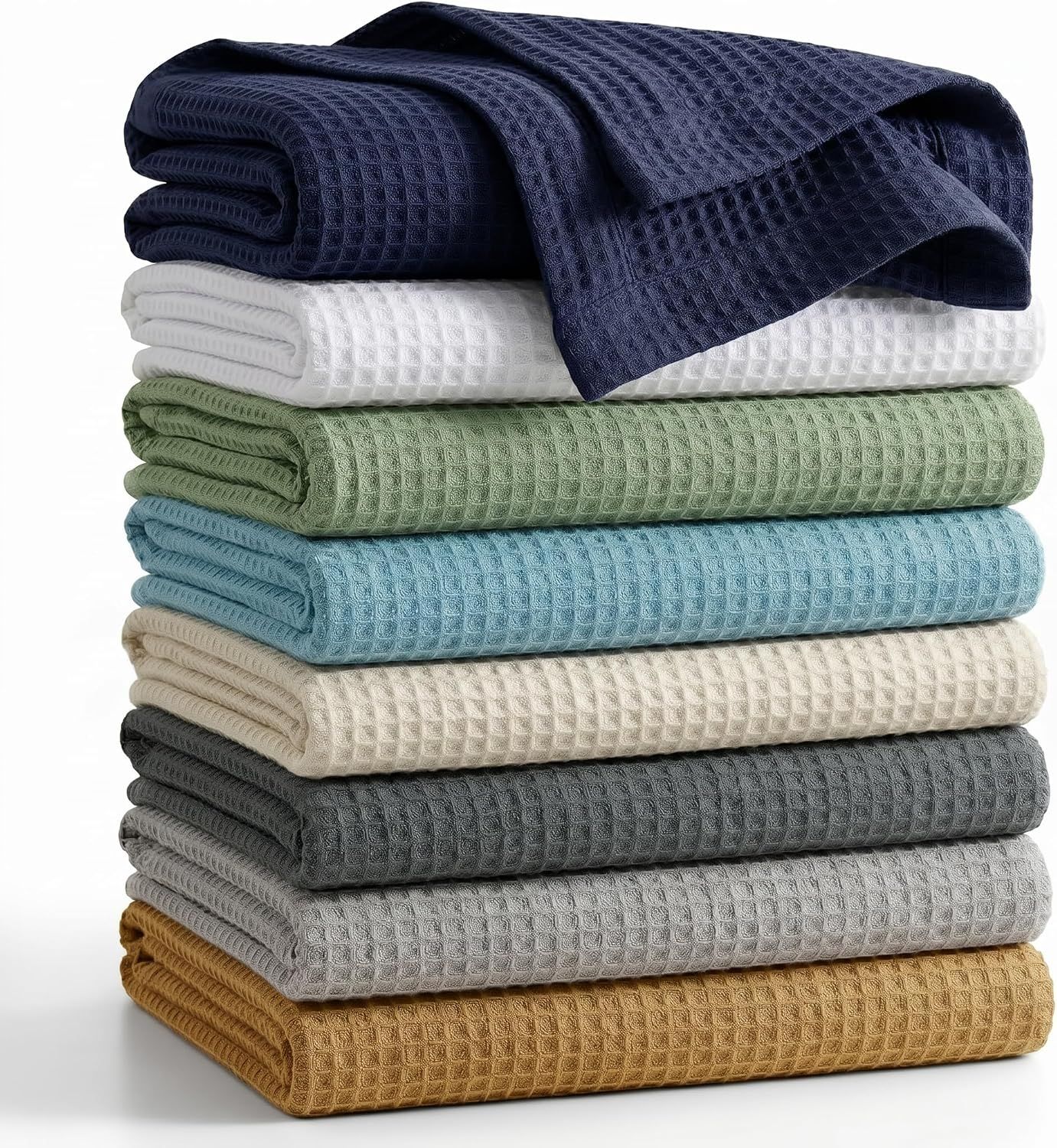 Displays the core product—waffle weave blankets or towels—in a clean, catalog-style presentation to show the texture and quality of the fabric. Shows the range of available color choices (navy,…