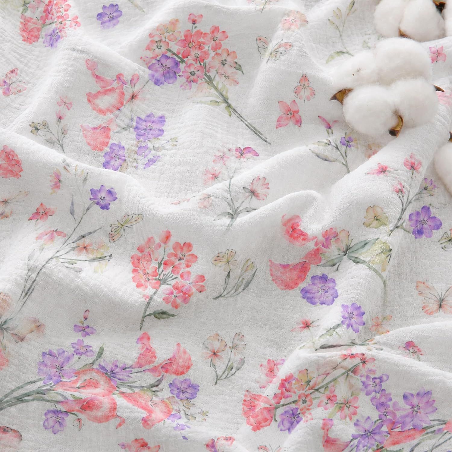 Showcases the product's delicate floral pattern and soft, draped fabric texture to communicate its aesthetic appeal and quality for home textiles or bedding. Presents the fabric in a styled, natural…
