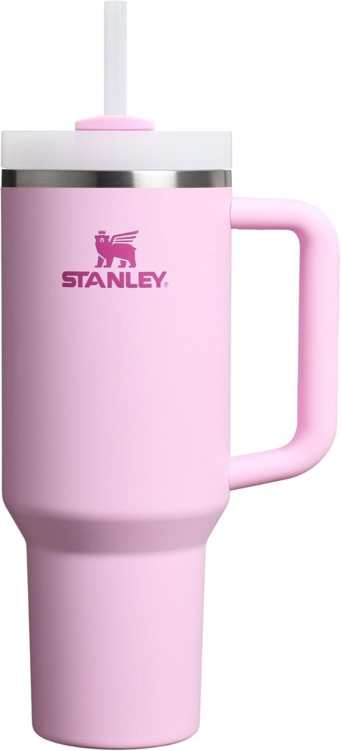 Displays the core product clearly on a white background to show the tumbler's design, branding, handle, and included straw lid for catalog browsing.