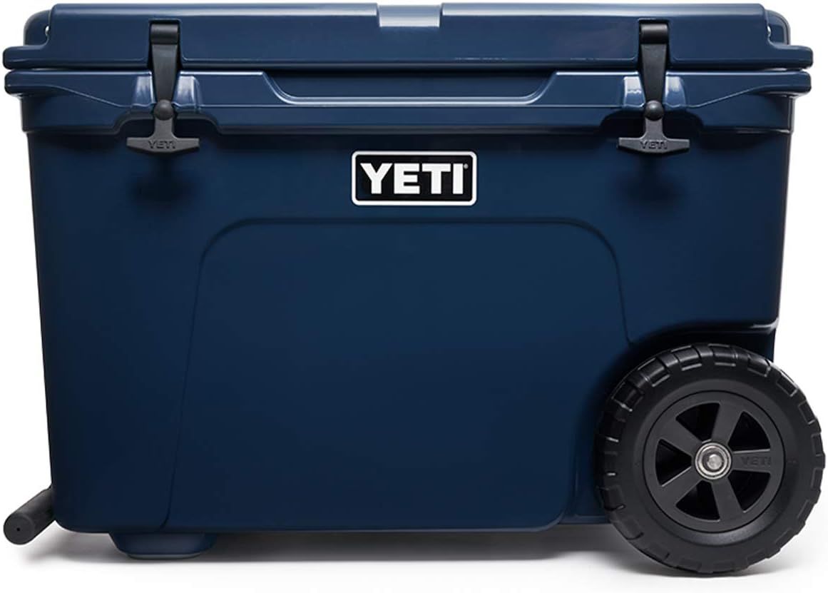 Displays the core product, a YETI wheeled cooler, in a clean catalog style to show its design, branding, and key features like the wheels and latches. Demonstrates the cooler's wheeled design and…