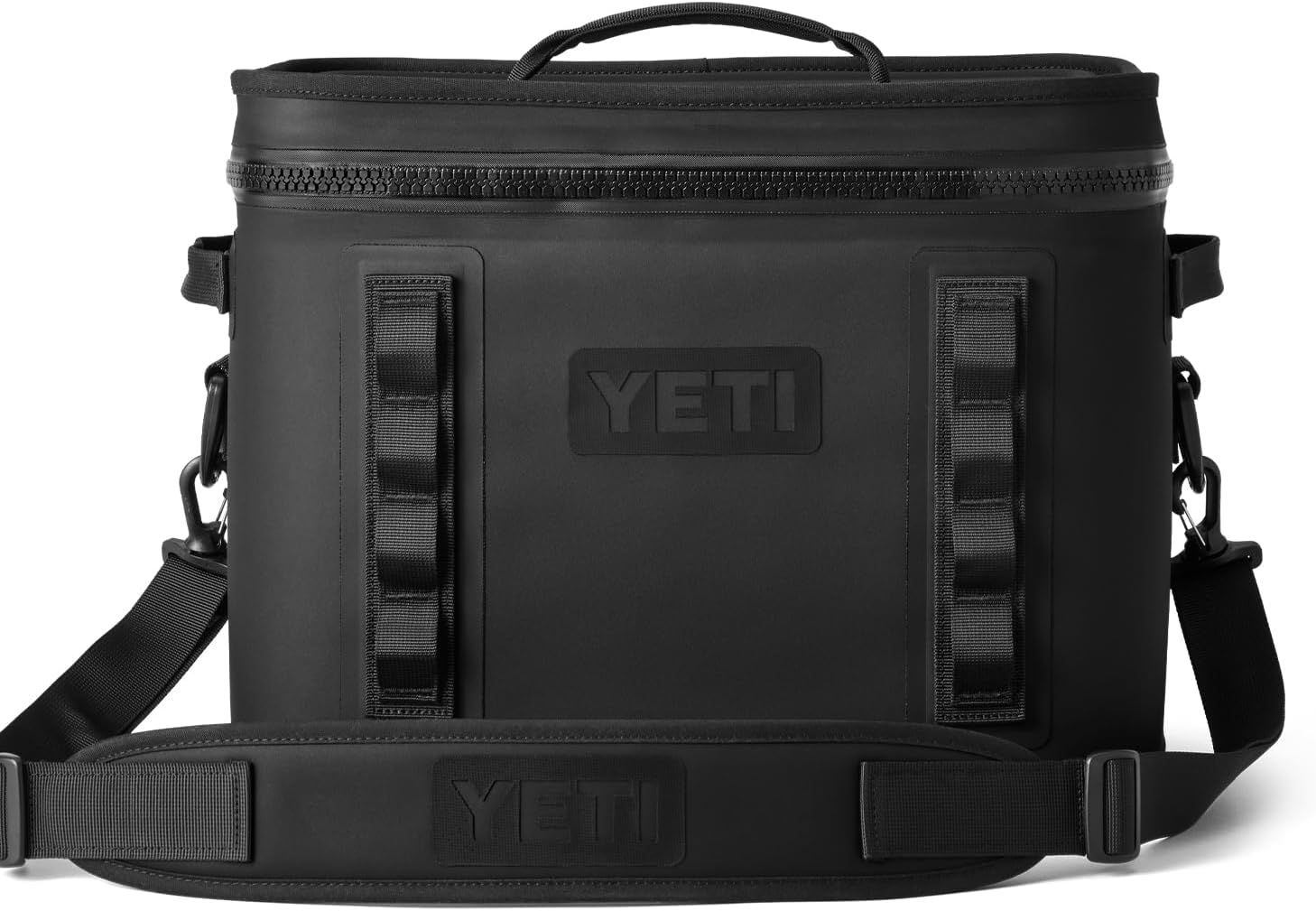 Displays the core product clearly on a white background to show the cooler's design, YETI branding, carrying handles, shoulder strap, and overall construction.