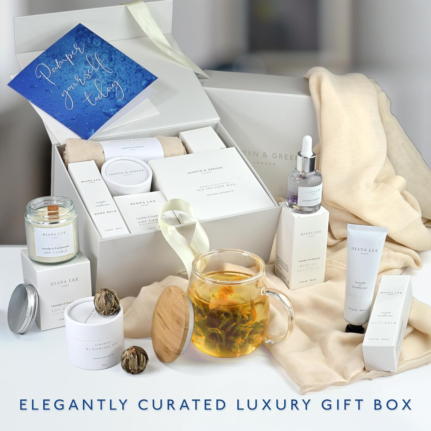 Shows all the items included in the elegantly curated luxury gift box, highlighting the various skincare products and accessories.