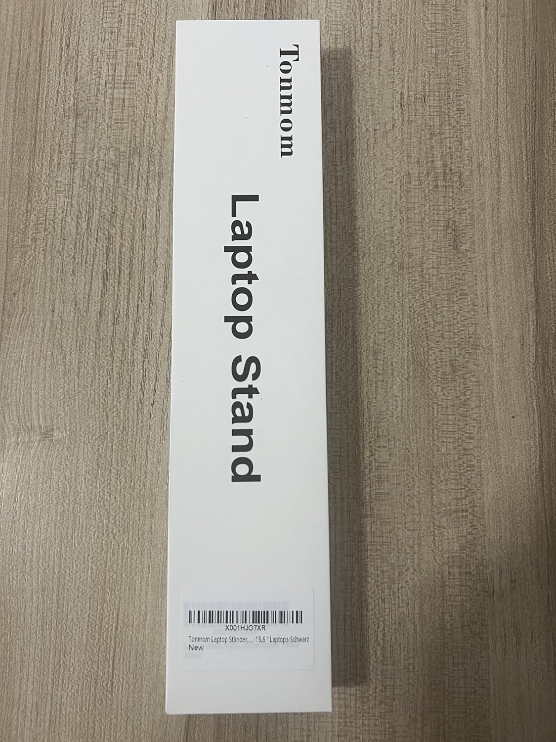 Displays the product name 'Laptop Stand' to clearly identify what the item is.