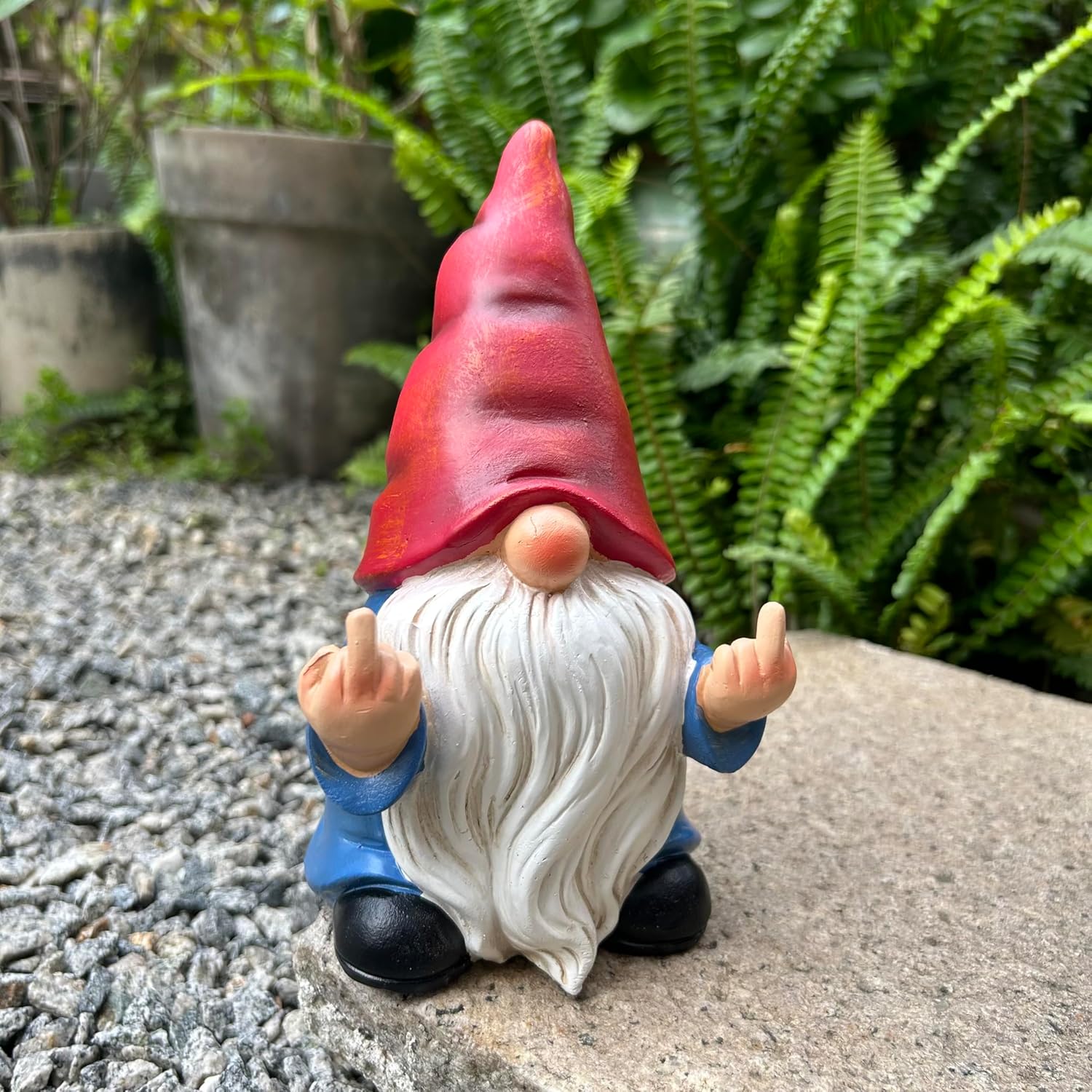 Shows the product in a realistic outdoor setting to demonstrate its use as a decorative garden ornament.