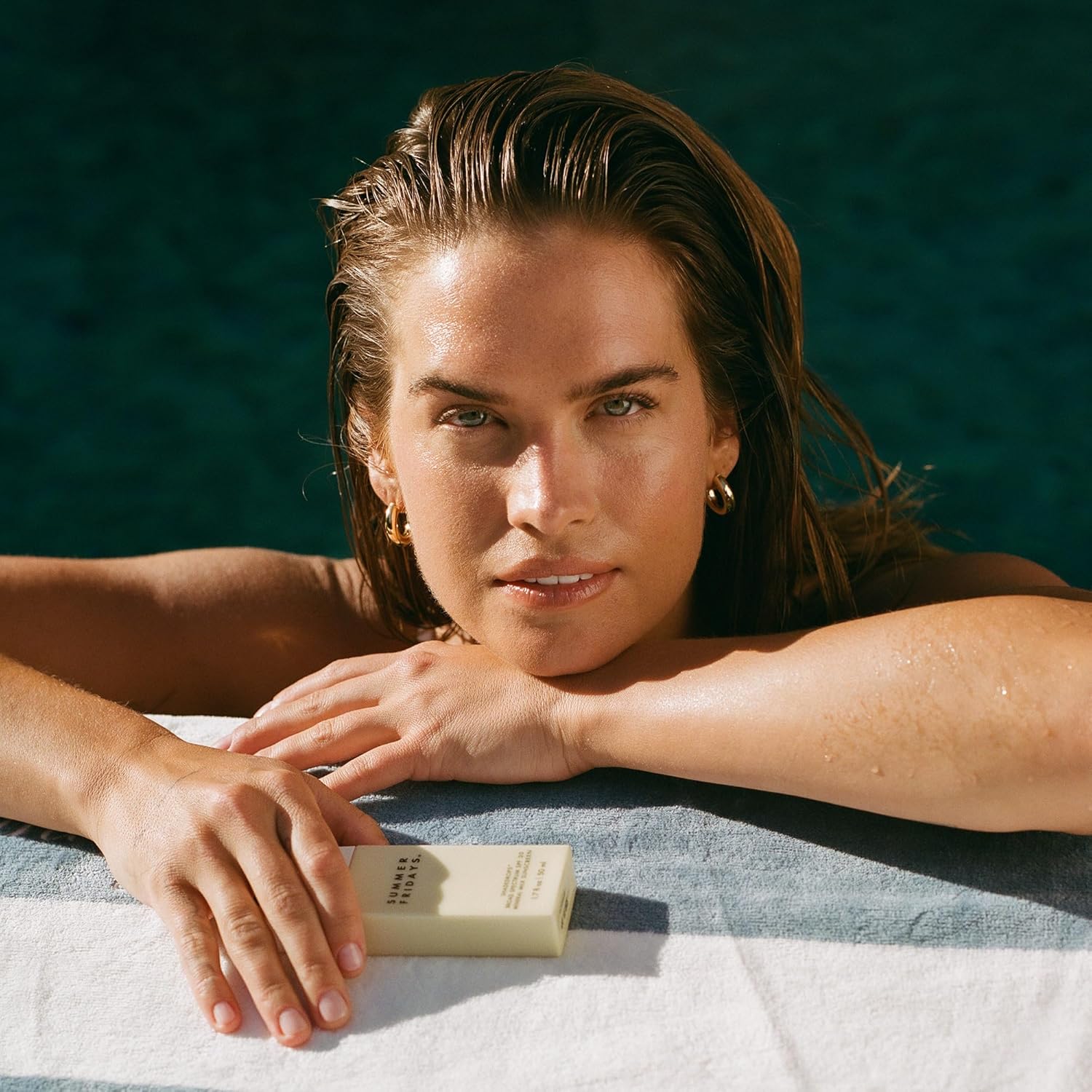Shows the product in a luxurious, spa-like setting to convey a sense of indulgence and self-care.