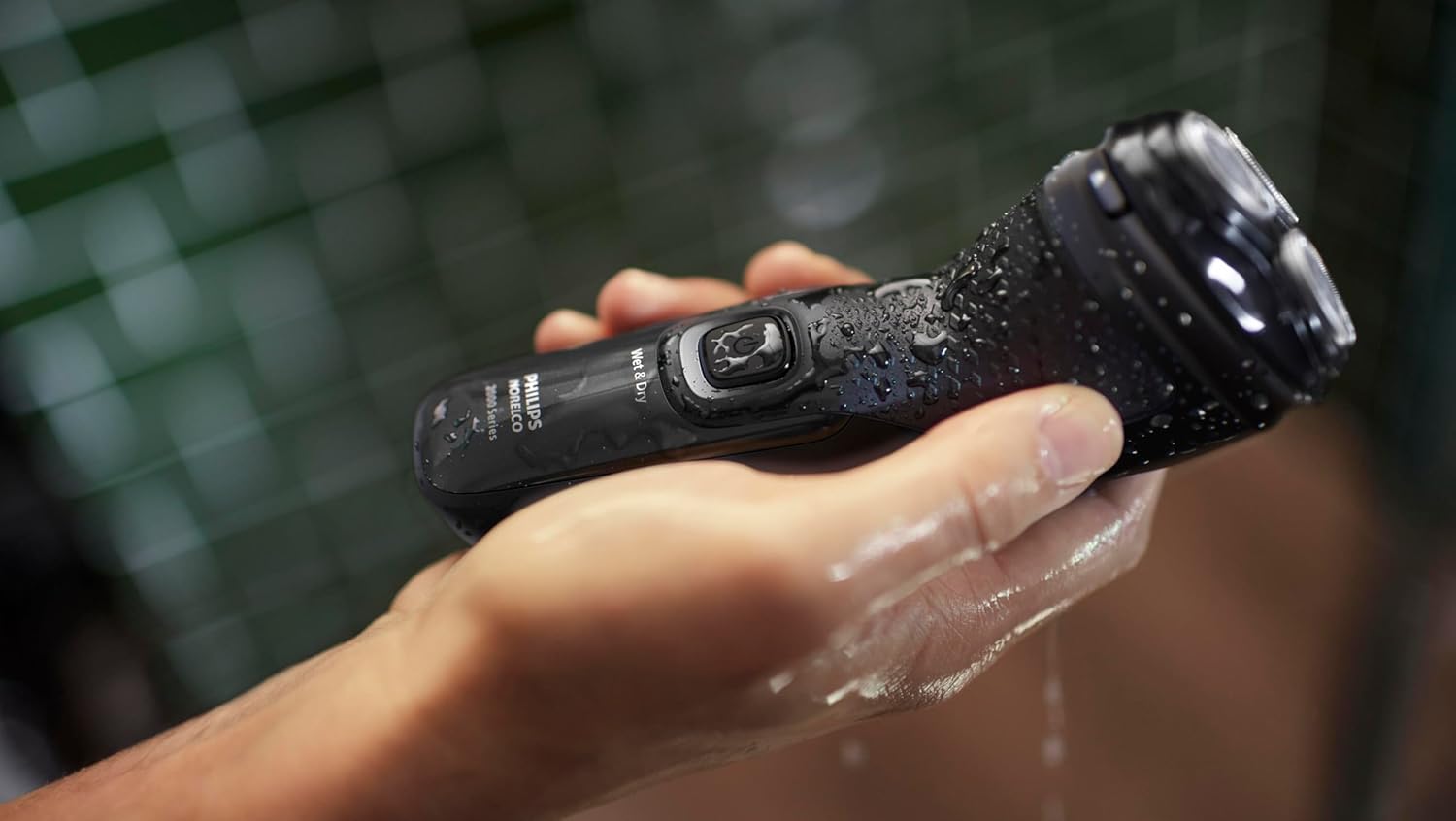 Product being used in shower to show waterproof capability