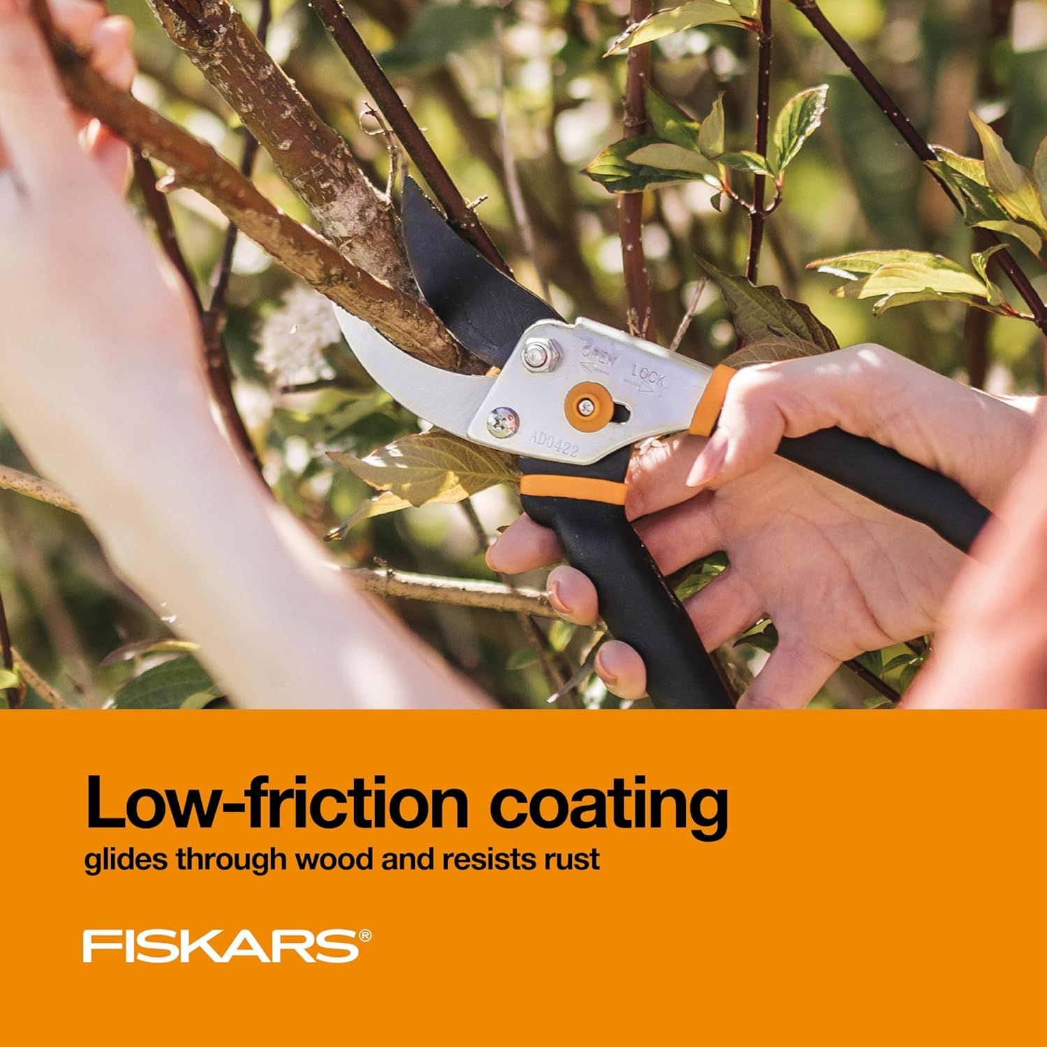 Highlights the pruning shears' low-friction coating that allows for smooth cutting and rust resistance, making gardening tasks easier and more efficient.