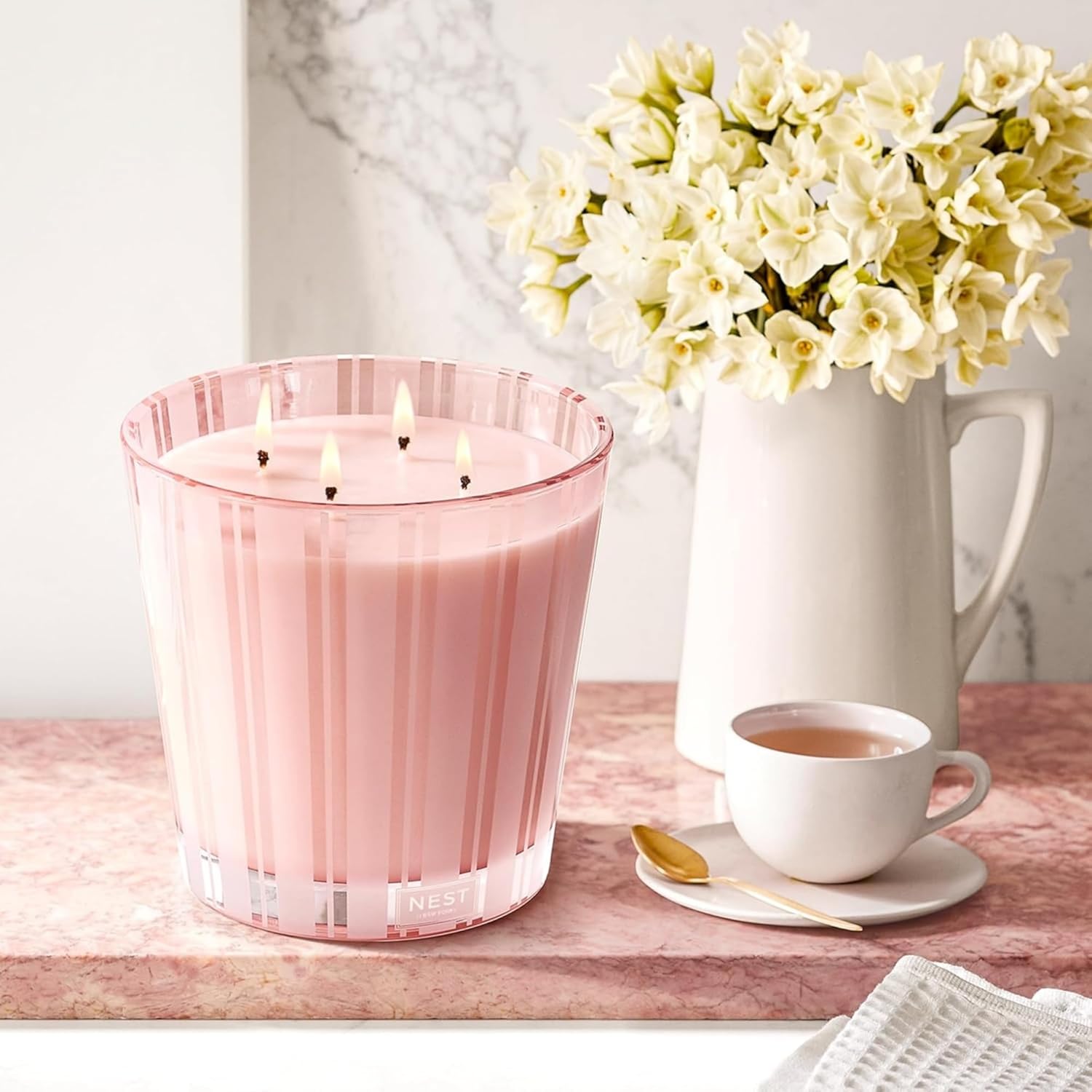 Showcases the product in a stylish, relaxing home setting to appeal to customers seeking to create a cozy atmosphere.