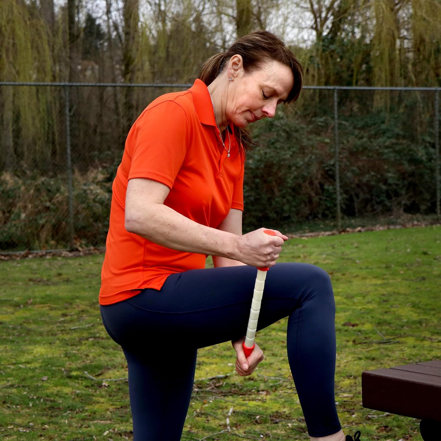 Shows the product being used in a real-world outdoor setting, demonstrating its suitability for exercise or fitness activities.