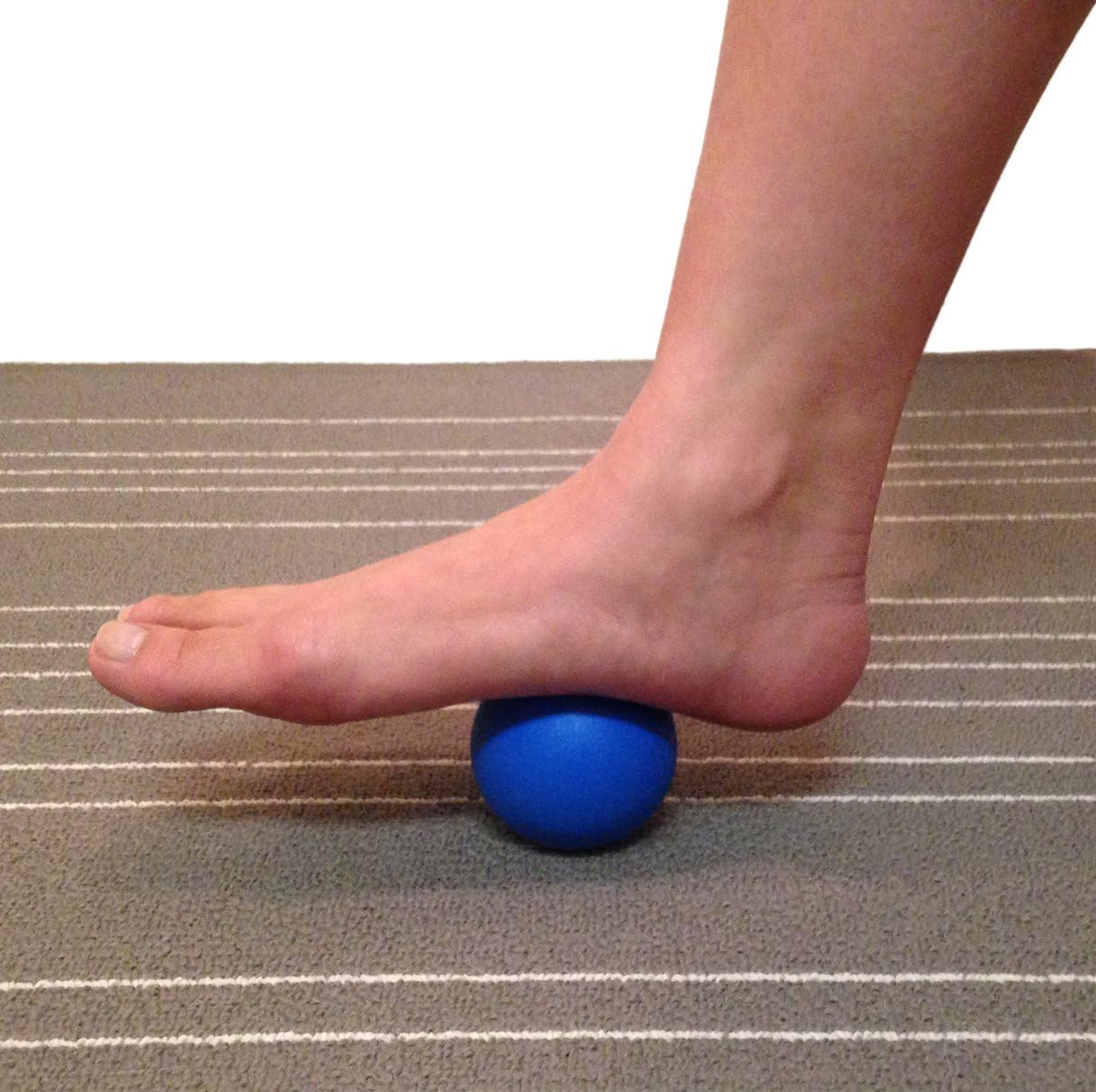 Demonstrates how to use the product for foot massage or pain relief by rolling the foot over the ball.