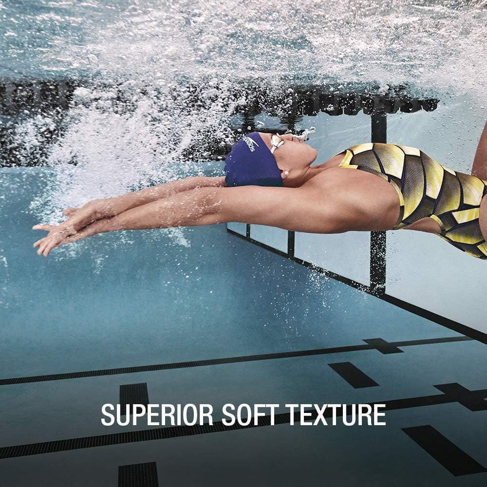 Highlights the soft and comfortable texture of the swimwear, emphasizing its quality and feel during athletic performance.