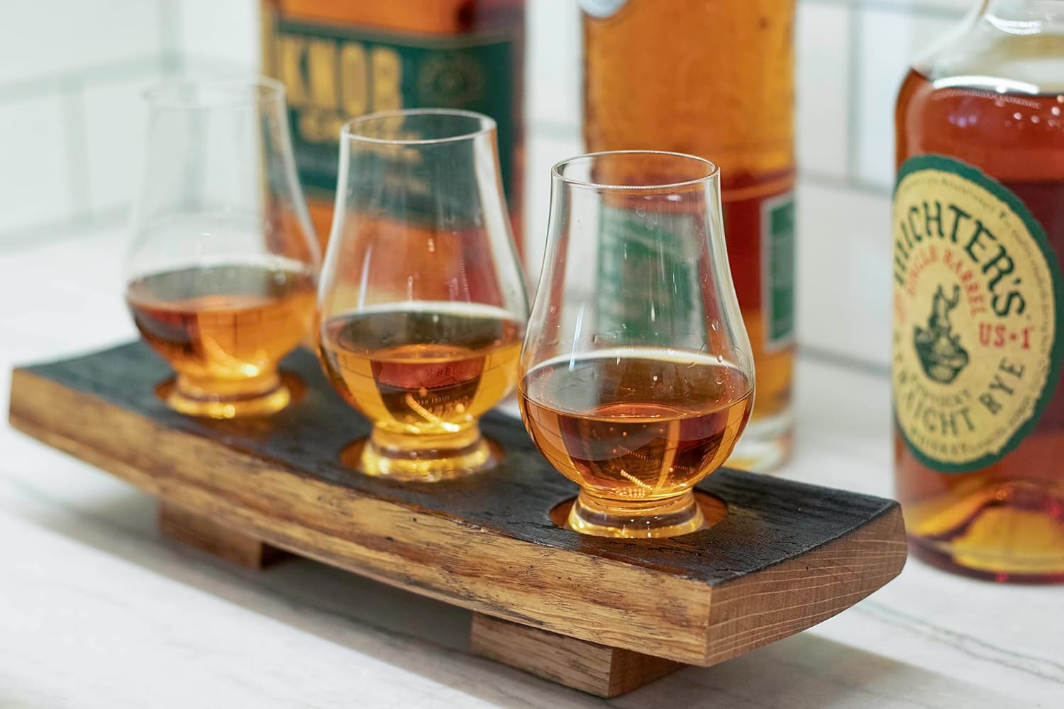 Demonstrates the product's use for whiskey tasting, showcasing how it enhances the experience of sampling different whiskeys.