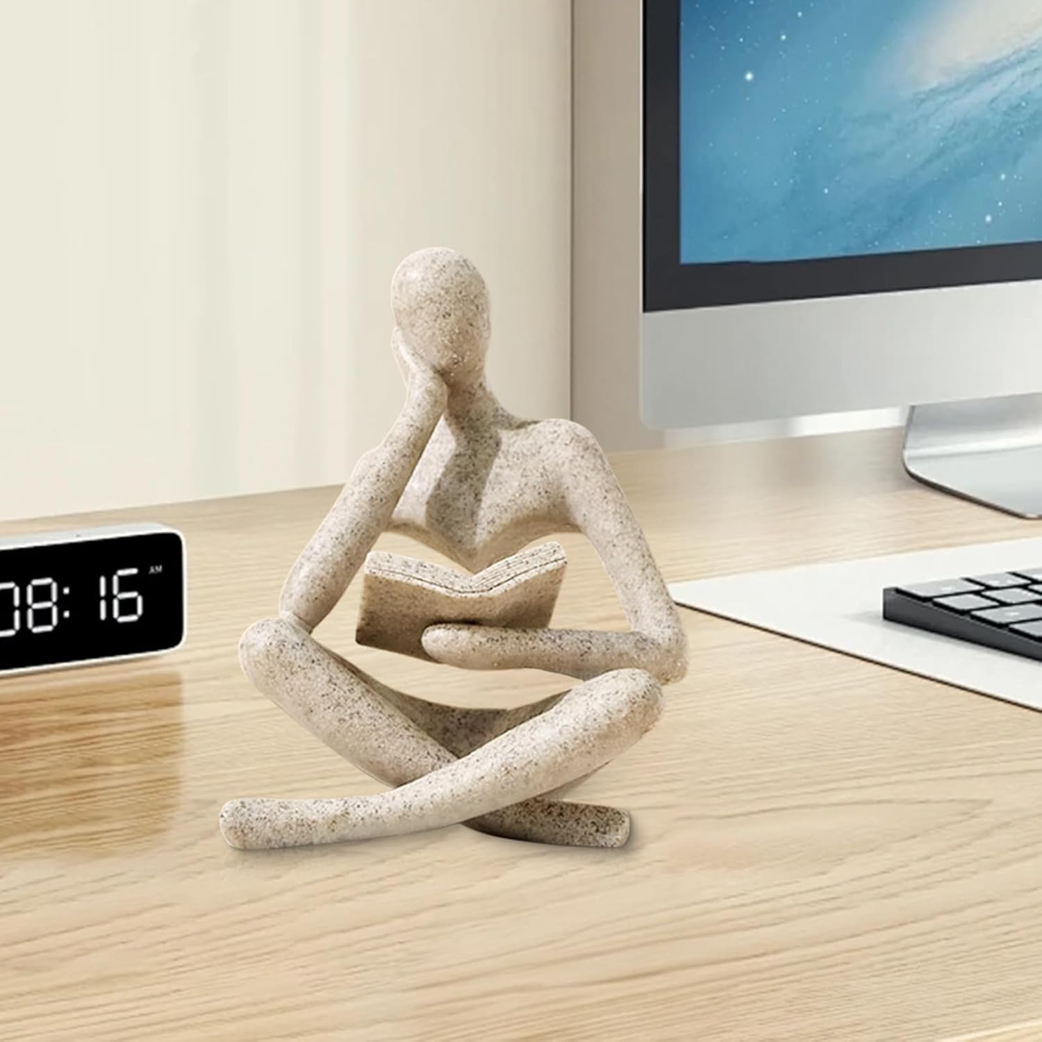 Shows the product in a real-world context on a desk, demonstrating how it can be used as an attractive and thoughtful decorative piece in a home office or workspace.