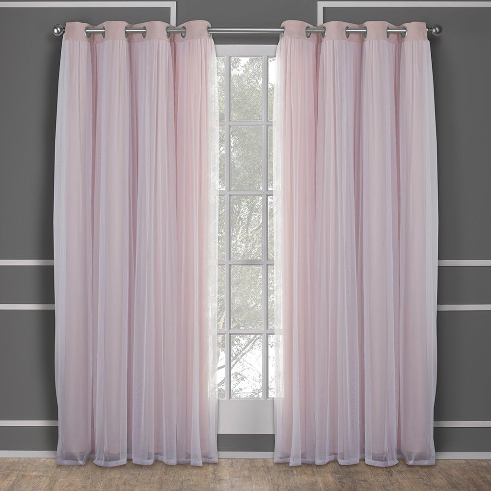 Shows the curtains installed in a real room setting to help shoppers visualize how they would look in their own home.