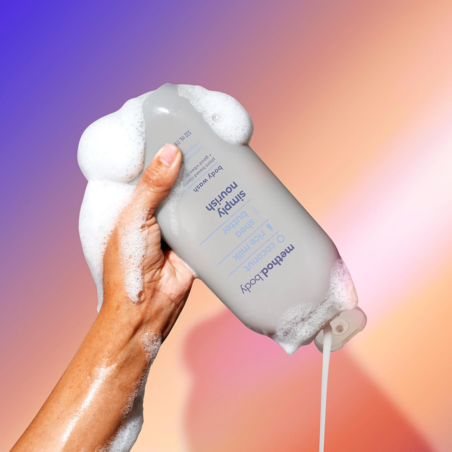 Demonstrates the rich, foamy lather of the body wash to highlight its effectiveness and luxurious feel.